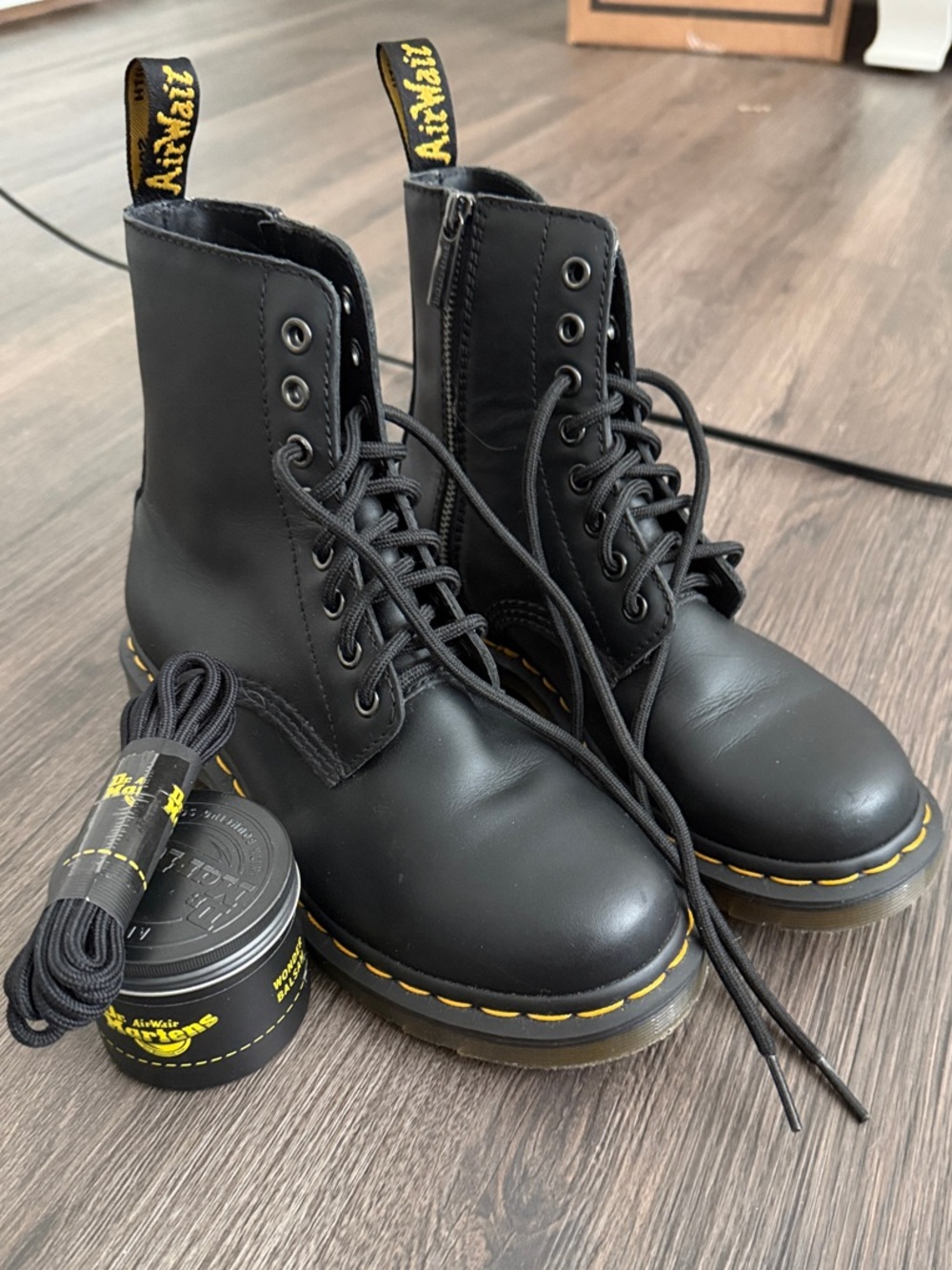 Dr. Martens Black 8-Eye Leather Combat Boots with Yellow Stitching